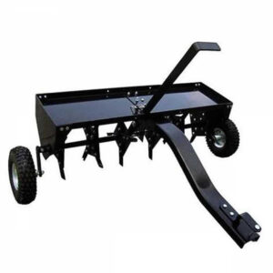 Aérateur scarificateur tracté disques pour tracteur tondeuse avec dispositif d'attelage